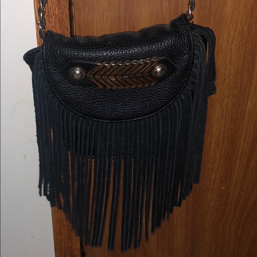 Fringed clutch bag
